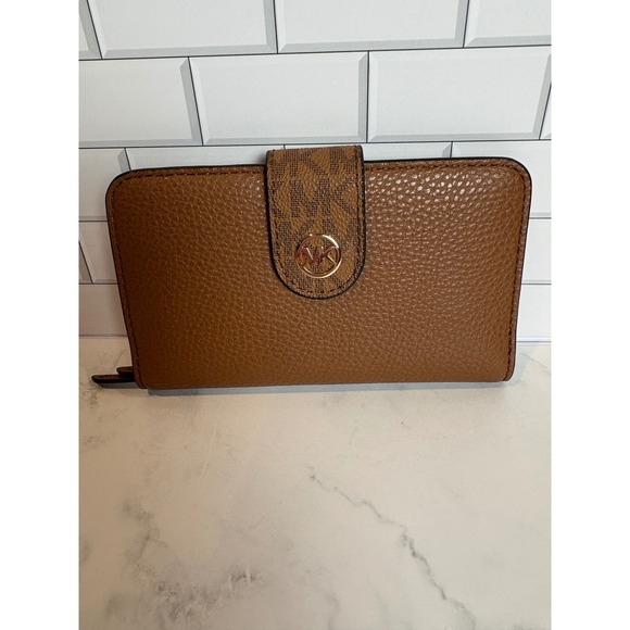 Michael Kors Handbags - NWT Michael Kors Jet Set Medium Tab Bifold Wallet Luggage Brown Leather
